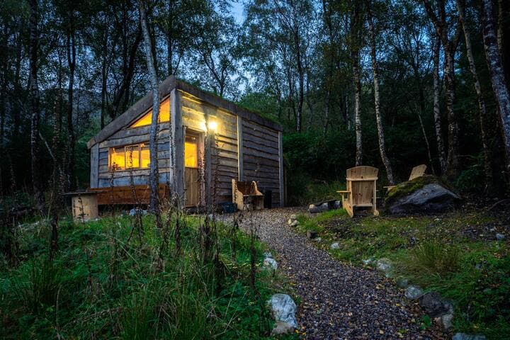 Glenaladale as night falls, cosy up inside or take a seat at the Firepit/BBQ just outside the door