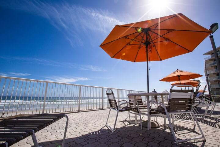 Plenty of tables and chairs for all guests.