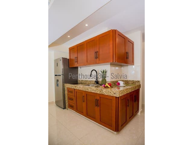 Nice kitchen with fridge and all you need to make small meals. Includes stove, microwave, dishes, pots, toaster and utensils.