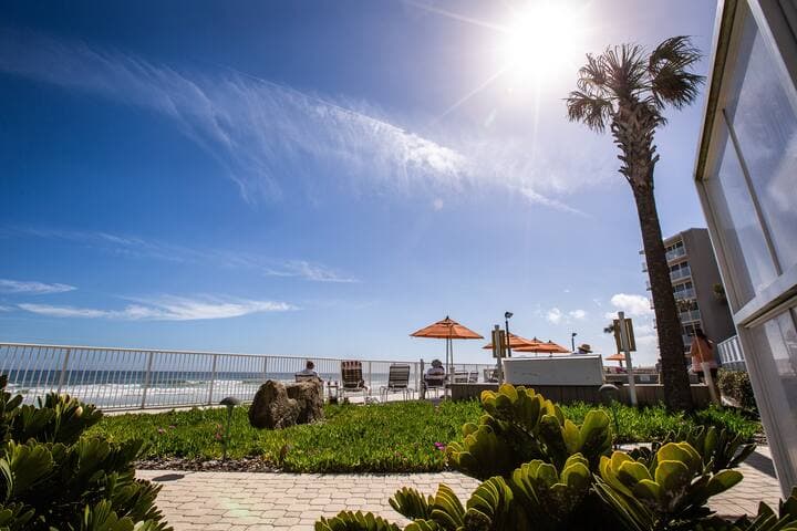 Nicely landscaped pool deck area.