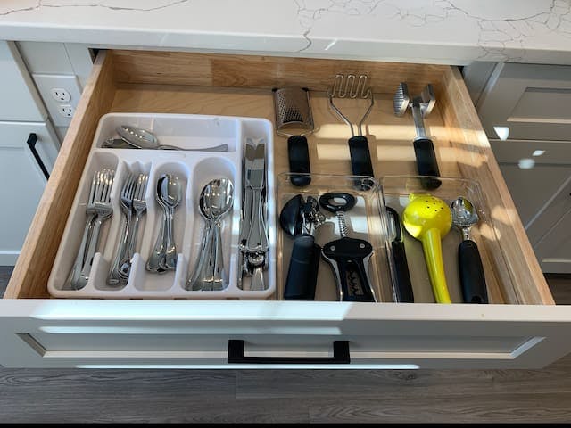 Silverware and other kitchen utensils. 