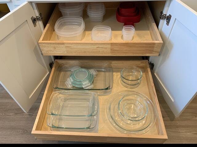 Plastic storage containers and glass bakeware.  