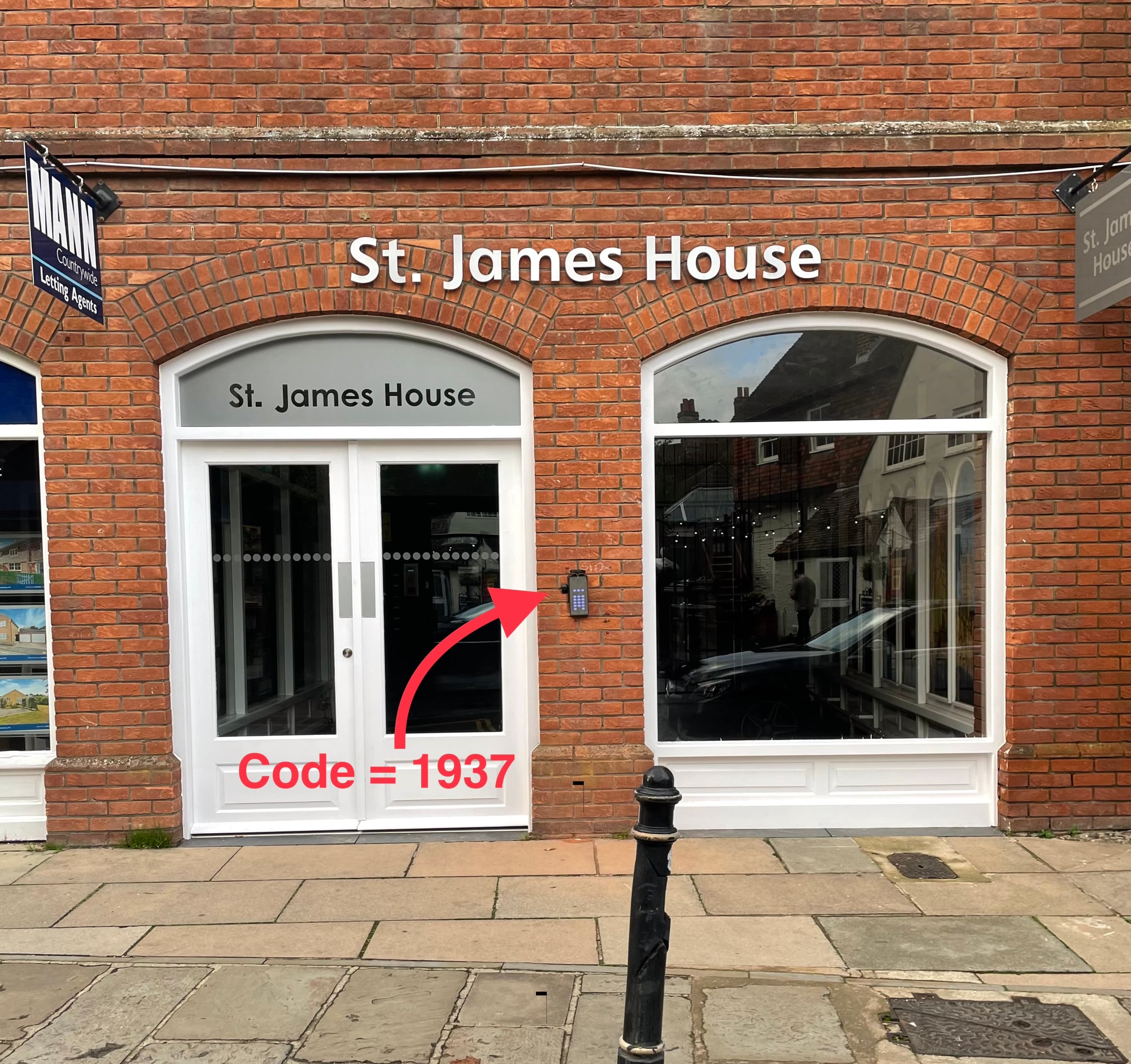 From the street, use the keypad on the wall, code 1937 will unlock doors. Then go to metal gates.