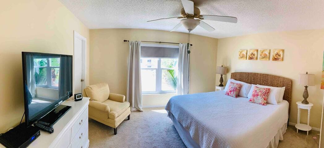 Updated master bedroom with a BRAND NEW King Tuft & Needle plush mattress & crisp linens, room-darkening shade and curtains, plenty of storage and en-suite bath for privacy.