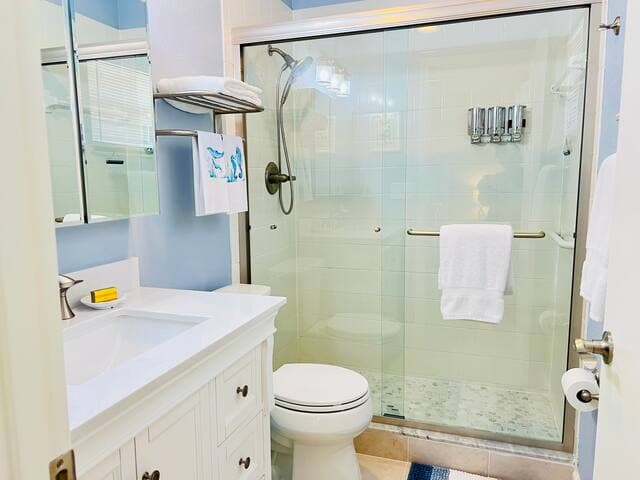 Primary bathroom features walk in shower.