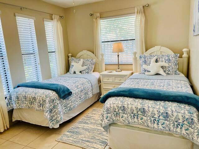 Second bedroom features comfy twin beds and has adjoining Jack & Jill style bathroom.