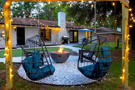 Truly a one of a kind experience. Enjoy the gas fire pit, egg chairs, putting green, patio, and more!