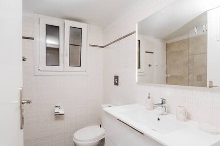 The bathroom is not en suite. Ιt's located right beside the bedroom and available for everyone’s use.