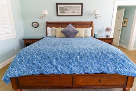 King bed in the master bedroom on main floor