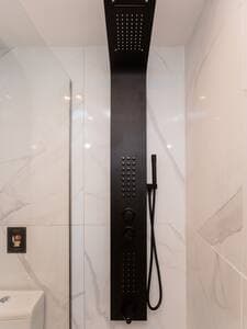 A small bathroom, yet fully equipped with all the spa-like comforts women love! Elegant, relaxing, and thoughtfully designed.