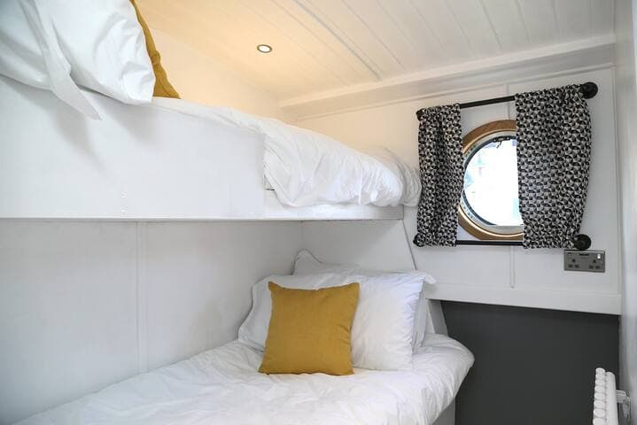 Bunk bedroom with luxury cotton bedding.