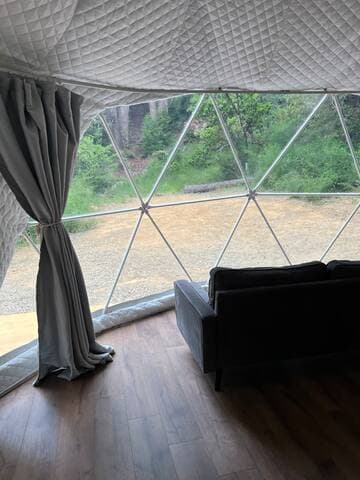 Your warm, private view in a gorgeous redwood grove. Breathe