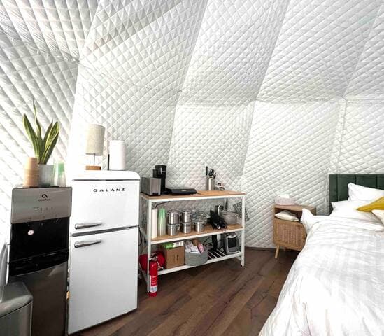 Kitchen area includes fridge, Keurig coffeemaker, induction stove top, pots & pans, utensils, knives, dish ware etc.