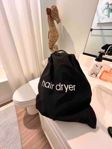 Hair dryers in both bathrooms.