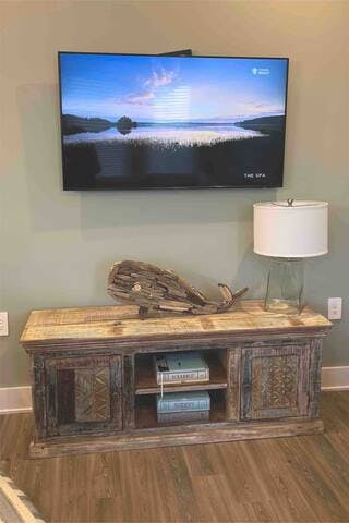 Smart TVs in Living room and bedrooms.