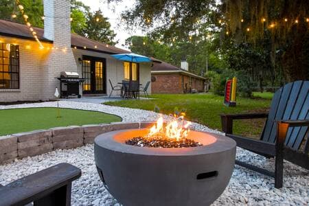 Gas fire pit and stone wall seating area