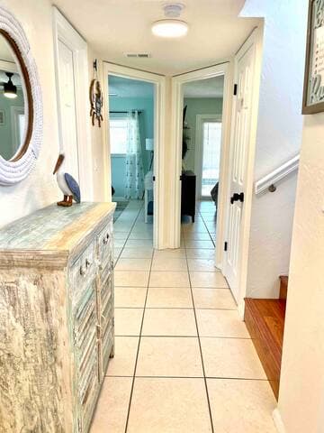 Main entry foyer on main level with full bath and three bedrooms.