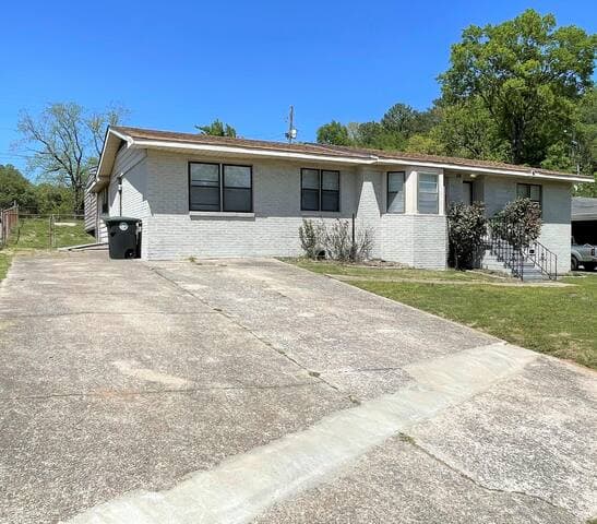 The driveway is 18 x 43 ft. and can accommodate up to five cars and also oversized work vehicles.