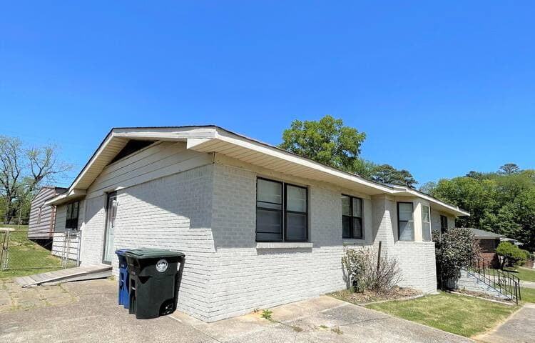 Left side of house with ramp for accessibility assistance