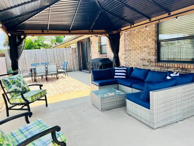 Enjoy the outdoor gathering area under the new pergola!