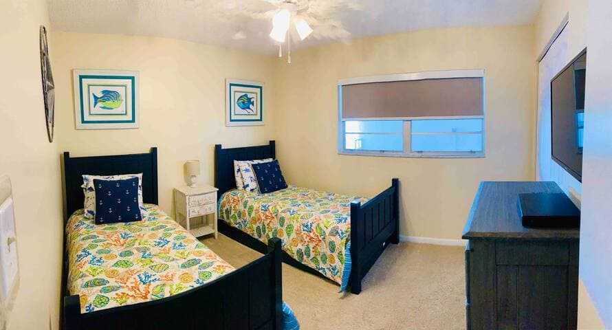 Twin beds plus trundle bed to accommodate three comfortably. Room-darkening shade for a good night’s sleep. Pack & play for infants also available for all your family’s needs!