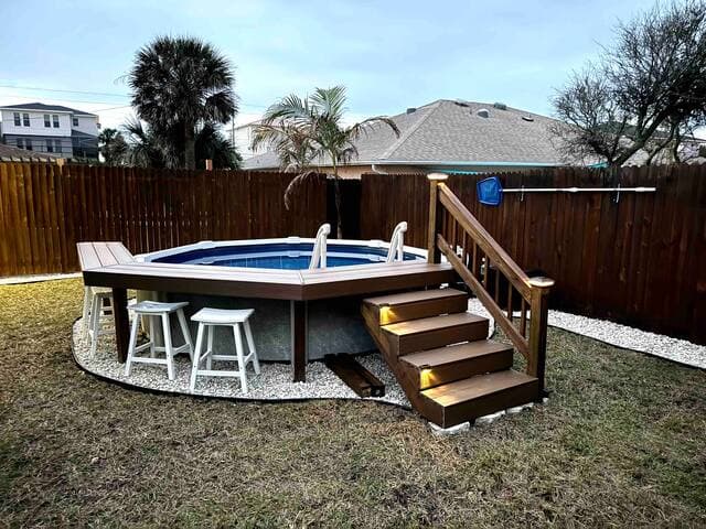Your own backyard oasis includes a refreshing pool, spacious private yard and outdoor shower!