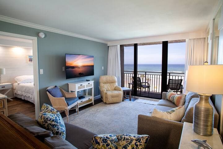 Living room and looking into master bedroom