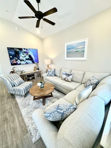 Relax in this cozy living room with comfortable seating for 6