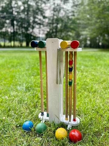 Everyday is a lovely day for croquet! The lake view front lawn is the perfect spot to set up a court