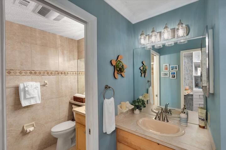 Ensuite features two sinks and a full-size shower.
