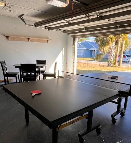 Enjoy a game of ping pong with the music playing and garage door open!