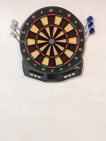 Electronic dart board in the Game Room located in the garage!