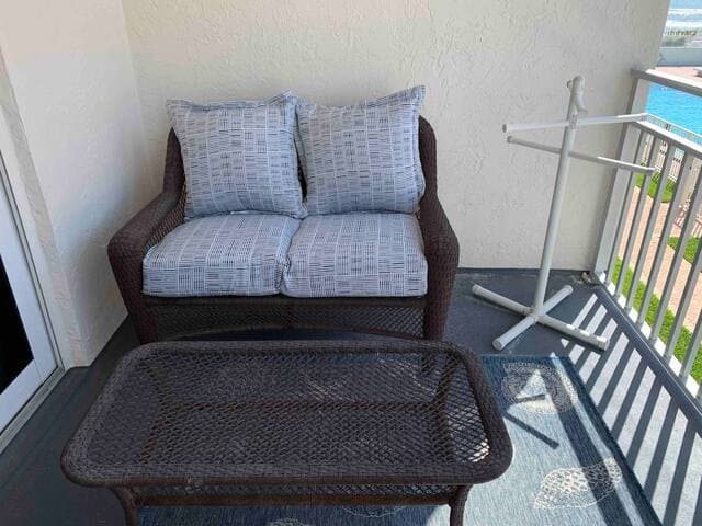 Our patio has a great view of the pool area and ocean. Lots to see without a lot of wind!