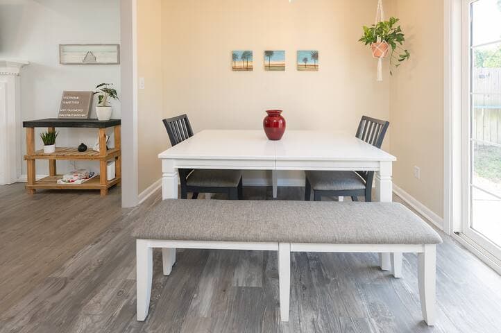 With 2 benches and 2 chairs, you can easily fit 6 adults and a couple children.