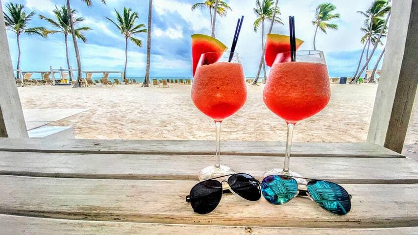 It takes longer for the bar to prepare your favorite frozen cocktails than it does to walk to the beach where they serve them.
8 min walk