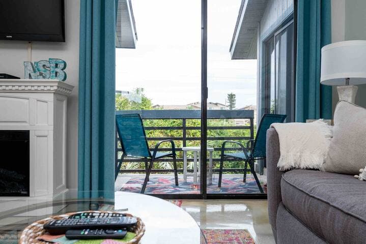 Cozy balcony for two faces east toward the Atlantic Ocean. Perfect spot to enjoy a cup a coffee while catching a sunrise.