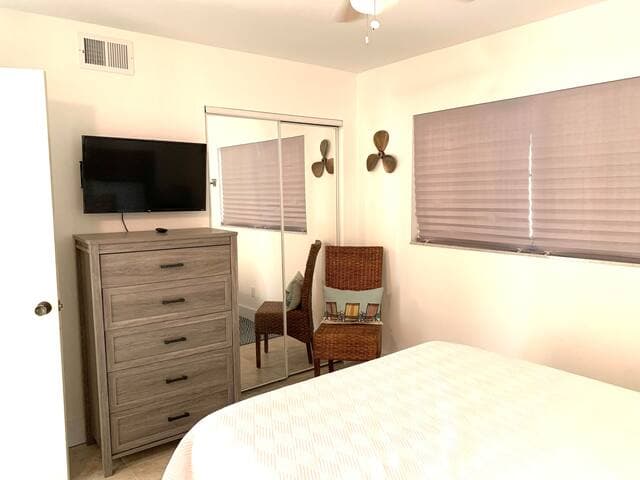 Guest bedroom has full closet and dresser for plenty of storage including under bed area to store suitcases. Wind down in the evenings with this 32”smart tv for all your streaming needs!