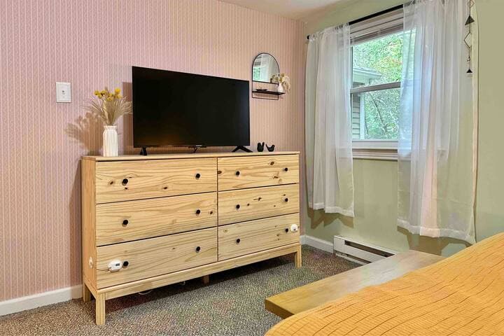 Unpack and stay a while! This room has a closet & 6 drawer dresser as well as a Smart TV with Netflix