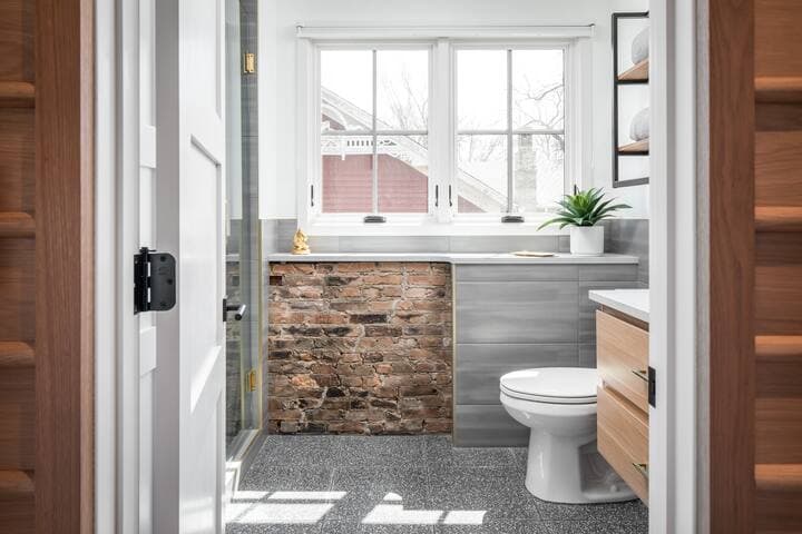 We exposed historical features wherever we could. Have you showered next to 150+ year old brick? Highly recommended!