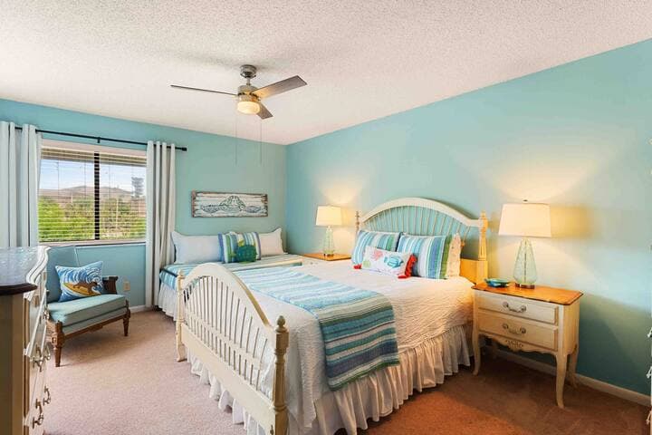 Bedroom features 1 queen & 1 single daybed. Choice of twin air mattress or portable cot for 3rd bed. Suitable for up to 2 adults, maximum total capacity of 4