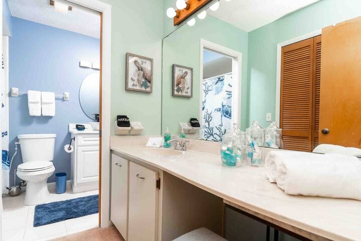 Dressing room located between bathroom & bedroom