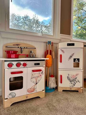 The playroom has a woodland play kitchen filled with everything your little one needs to make a memorable meal - including matching aprons!
