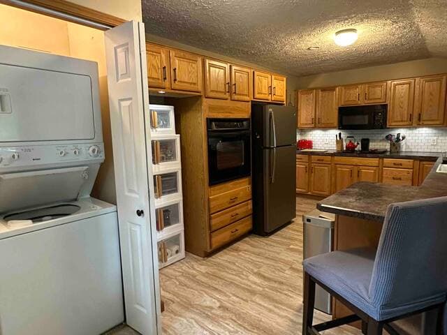 This fully equipped kitchen has an in-wall oven, stove, electric griddle, crockpot, toaster, dishwasher & microwave. There’s enough pots, pans, and dishes to cook a big family meal!
Private full size washer and dryer also located off the kitchen