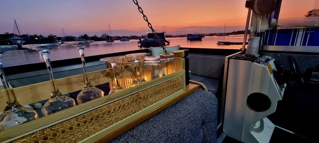 Watch as the sunset cruise boats cruise bye