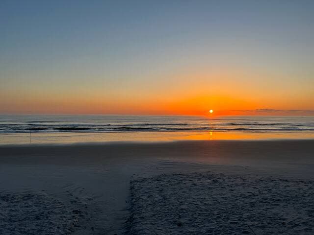 Morning sunrises on the beach are just a short walk across the street to the no-drive section of the beach via 2 nearby accesses. From condo door to sand in toes is 6-10 minutes.