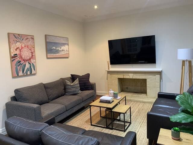 Comfortable leather coaches to relax and unwind after a full day exploring Perth CBD, which is only 7km away from @yokinebnb