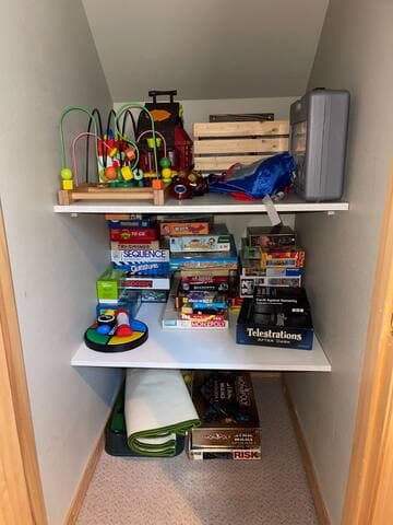 Puzzels, board games for all ages, toys, poker chips and poker table top, and golf putting mat.