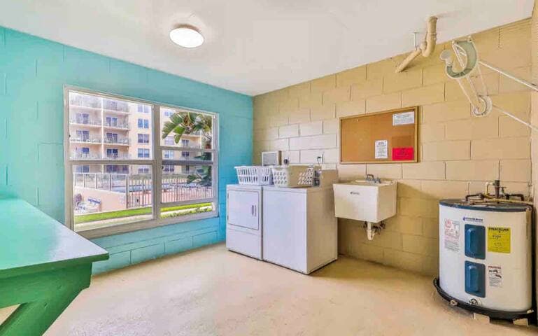 Two Coin or credit card app operated laundry rooms on each floor and one located right outside the unit!