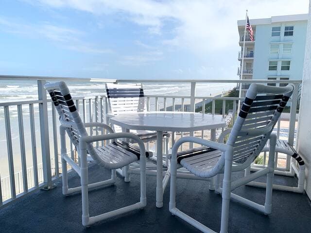 Seating for four plus two ottomans on our balcony! Enjoy coffee, lunch, cocktails and company Oceanside!