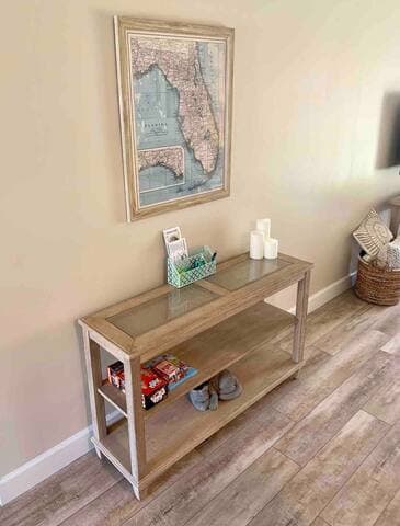 Check-in area with condominium information, pool bands, local restaurant menus, and attraction information.